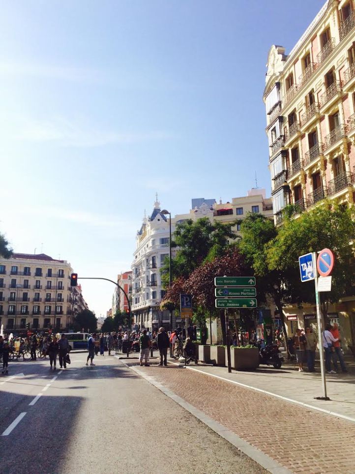 Fuencarral is empty of cars as the street is blocked off for a fiesta. 